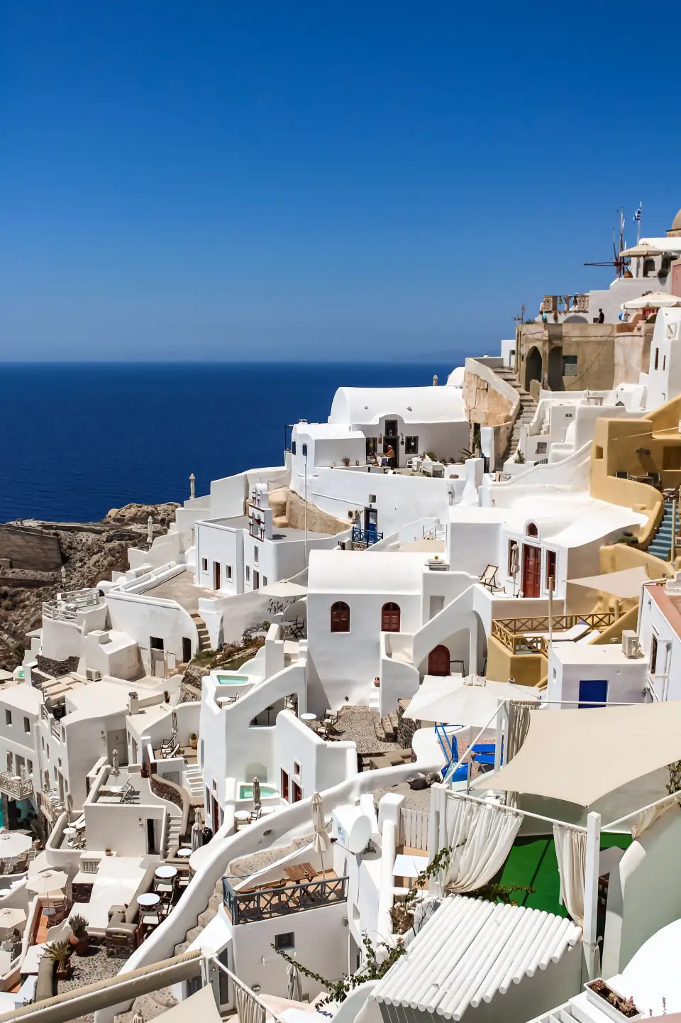Whitewashed cliffside houses of Oia above the Aegean Sea